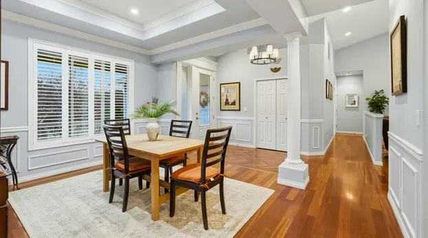 Formal dining room with hardwood floors